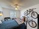 Bedroom with ceiling fan and natural light from the window, providing a bright atmosphere at 4858 S Semoran Blvd # 2108, Orlando, FL 32822