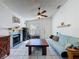 Open-layout living room featuring a fireplace and comfortable seating, ideal for relaxing at 4858 S Semoran Blvd # 2108, Orlando, FL 32822