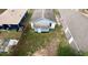 Aerial view of the property featuring a grass area and exterior features at 516 W 7Th St, Lakeland, FL 33805