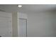 Bedroom with a white closet and hard surface floors at 516 W 7Th St, Lakeland, FL 33805