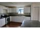 Updated kitchen featuring stainless steel appliances, granite counters, and modern backsplash at 516 W 7Th St, Lakeland, FL 33805
