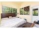 Inviting bedroom with lots of windows and natural light at 5641 Orange Ave, Intercession City, FL 33848