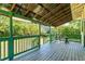 Inviting, spacious porch with room for outdoor seating and relaxing views at 5641 Orange Ave, Intercession City, FL 33848