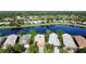 Aerial view of the homes in the neighborhood on the lake at 585 Grand Canal Dr, Poinciana, FL 34759