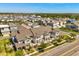 Aerial view of the neighborhood featuring well maintained landscaping and sidewalks at 7063 Nemours Pkwy, Orlando, FL 32827