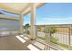 Private balcony offers neighborhood views, and features a metal railing at 7063 Nemours Pkwy, Orlando, FL 32827