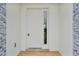 Inviting front entrance with stone accents and a modern door at 780 Kangaroo Ct, Deltona, FL 32738