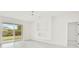 Bright living room with sliding glass doors leading to outdoor living space at 780 Kangaroo Ct, Deltona, FL 32738