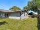 Fenced backyard with grass at 11125 Finchley Pl, Orlando, FL 32837