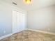 Bedroom featuring a closet, neutral paint, tiled flooring, and recessed lighting at 11125 Finchley Pl, Orlando, FL 32837