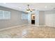 Primary bedroom featuring tile flooring, windows and access to the ensuite bathroom at 11125 Finchley Pl, Orlando, FL 32837
