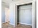 Spacious closet showcasing neutral paint, tiled flooring, and shelving to maximize storage at 11125 Finchley Pl, Orlando, FL 32837