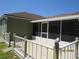 View of screened in patio and decorative parrot statue at 1155 Roan Ct, Kissimmee, FL 34759