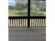 Cozy screened in patio overlooking a spacious backyard at 12 Robyn Ln, Haines City, FL 33844