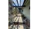Stone column walkway leading to the front door at 12 Robyn Ln, Haines City, FL 33844