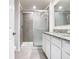 Bathroom featuring granite counters, walk in shower and tile flooring at 12035 Holystone St, Winter Garden, FL 34787