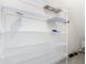 White wire shelving in a closet offers ample storage space at 12035 Holystone St, Winter Garden, FL 34787