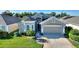 Charming single-story home with well-manicured lawn and inviting curb appeal at 121 Fitzgerald Ln, Davenport, FL 33837