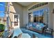 Inviting covered lanai with comfortable seating, perfect for outdoor relaxation at 121 Fitzgerald Ln, Davenport, FL 33837