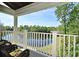 Balcony features a great view of the lake and surrounding foliage at 1230 Wright Cir # 5309, Celebration, FL 34747