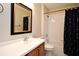 Bright bathroom with a framed mirror, vanity sink, and a shower and tub combination at 1230 Wright Cir # 5309, Celebration, FL 34747