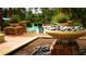 Community pool area showing the fountain and a glimpse of people enjoying the water at 1230 Wright Cir # 5309, Celebration, FL 34747