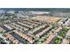 This scenic aerial view shows the proximity of this home to the highway, industrial zones and community amenities at 1454 Myrtlewood St, Davenport, FL 33896