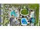 Aerial view of community amenities including pools, water park, a mini golf course, and recreation areas at 1454 Myrtlewood St, Davenport, FL 33896