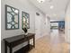 Inviting entryway with tile flooring leading to the living areas at 1454 Myrtlewood St, Davenport, FL 33896