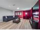 Cozy living room features a comfortable couch, contemporary furniture and unique decor at 1454 Myrtlewood St, Davenport, FL 33896