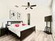 Serene bedroom with a dark wood bed frame, neutral walls, and lots of natural light at 14945 Huntcliff Park Way, Orlando, FL 32824