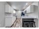 Updated kitchen with modern appliances, stylish flooring and sleek countertops at 150 N Post Office Rd, Kenansville, FL 34739