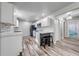 Updated kitchen with modern appliances, sleek countertops, and stylish flooring at 150 N Post Office Rd, Kenansville, FL 34739