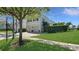Charming two-story home boasts a well-maintained lawn and a two-car garage at 1506 Euston Dr, Reunion, FL 34747
