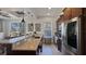 Modern kitchen boasts stainless steel appliances, granite countertops, and ample cabinet space at 1506 Euston Dr, Reunion, FL 34747