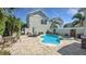 Private backyard with a refreshing pool, spa, and plenty of space for outdoor entertaining at 1506 Euston Dr, Reunion, FL 34747