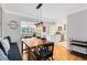 Dining room with a wooden table and a view to the kitchen and living room at 1510 E Ridgewood St, Orlando, FL 32803