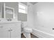 Clean and bright bathroom with a single sink vanity and shower-tub combination at 1532 Reade Cir, St Cloud, FL 34772