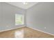 Bedroom with tile floors, ceiling fan, and natural light at 1532 Reade Cir, St Cloud, FL 34772