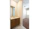 Bathroom featuring a light-colored countertop and a doorway view to a bedroom at 1607 Tail Feather Dr, Kissimmee, FL 34746