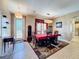 Formal dining room showcasing elegant decor, a decorative rug and stylish lighting at 1915 Acacia Dr, Kissimmee, FL 34758
