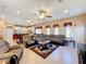 Spacious living room with neutral tones and abundant natural light from many windows at 1915 Acacia Dr, Kissimmee, FL 34758