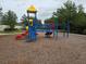 Community playground with slides and climbing structure at 1915 Acacia Dr, Kissimmee, FL 34758