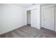 This is an unfurnished bedroom with a closet, offering a blank canvas for personalization and comfort at 219 Summerlin Loop, Haines City, FL 33844