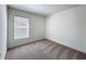 An unfurnished bedroom with natural light streaming through the window, creating a bright and inviting space at 219 Summerlin Loop, Haines City, FL 33844