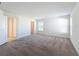 Bright bedroom with a window and neutral carpet, offering a cozy and inviting space at 219 Summerlin Loop, Haines City, FL 33844