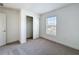 Cozy bedroom with neutral carpet, closet and window offering natural light at 219 Summerlin Loop, Haines City, FL 33844