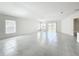 Bright, airy living room featuring tiled floors and abundant natural light through large windows at 219 Summerlin Loop, Haines City, FL 33844