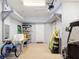 This garage is equipped with shelves, a work bench, and plenty of room for storage at 2502 Palm Tree Dr, Poinciana, FL 34759