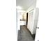 This hallway provides convenient access to the bathroom and closet at 2538 Citrus Club Ln # 105, Orlando, FL 32839